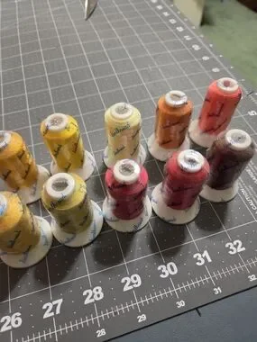 Brother | Art | Brother Decorative Thread Spools In Red Orange Yellow ...